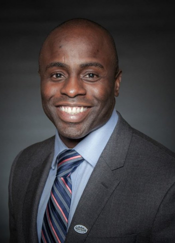 Dr. Richard Osibanjo Vikki Espinosa Associate headshot